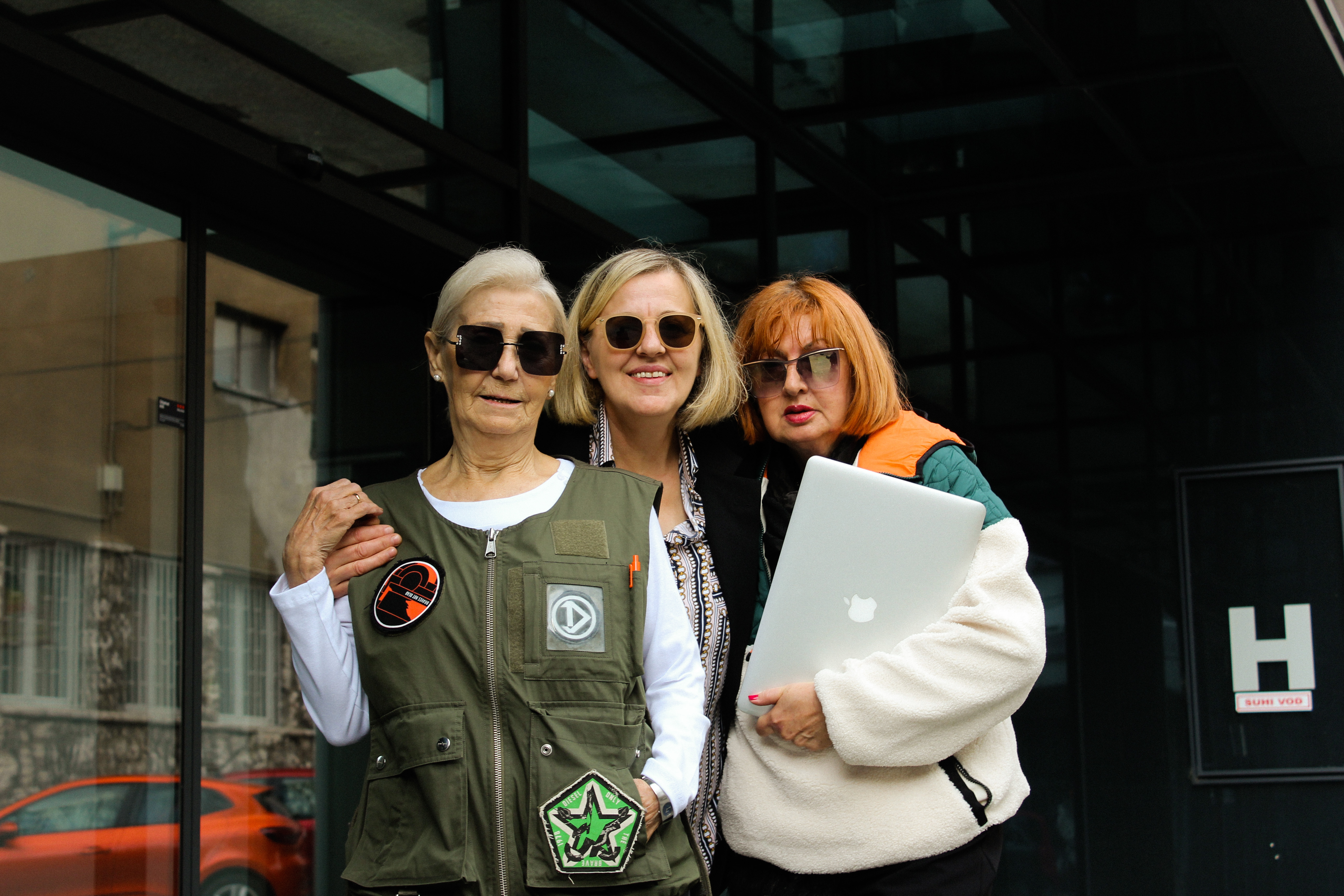 image of 3 older ladies posing with technology and looking awsome with it